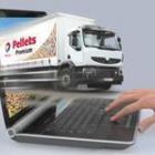 camion sortant d'un écran d'ordinateur portable